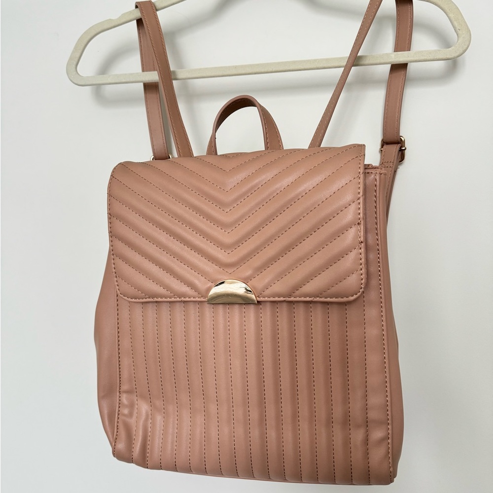A new day faux leather backpack